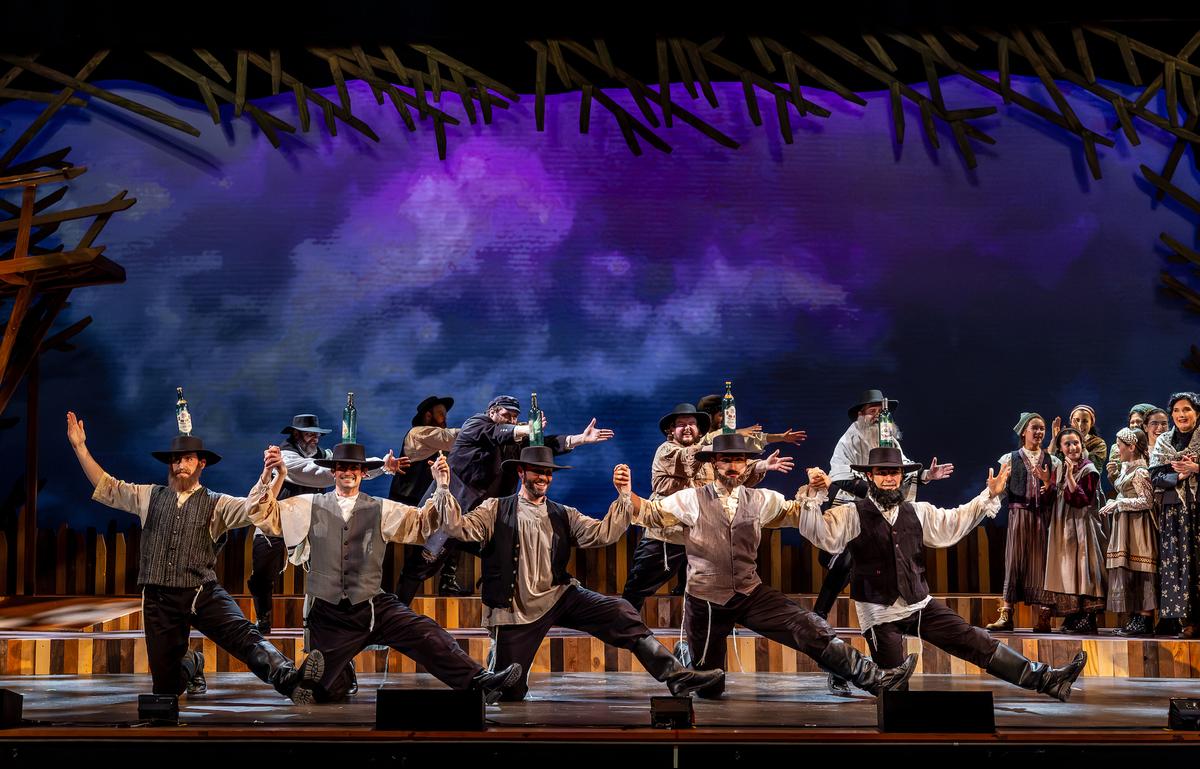 The men dance in what may be the musical's most famous scene, in "The Fiddler on the Roof." (Brett Beiner)