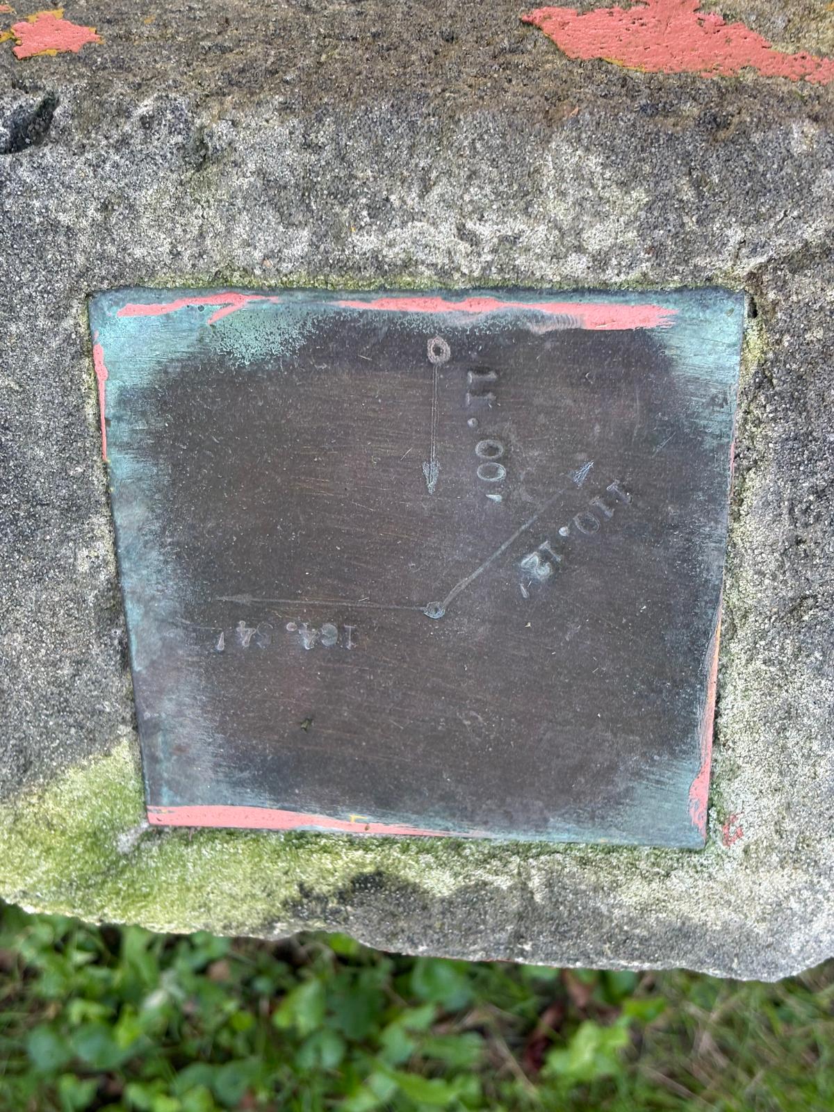 An old marker points visitors in the direction of the chimney. (Deena Bouknight)