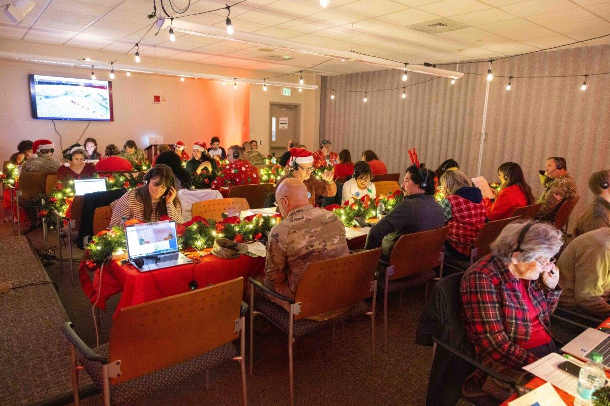Monitoring Santa’s whereabouts on Dec. 24, 2024, at the NORAD Tracks Santa Operations Center, located at Peterson Space Force Base, Colo. (Public Domain)