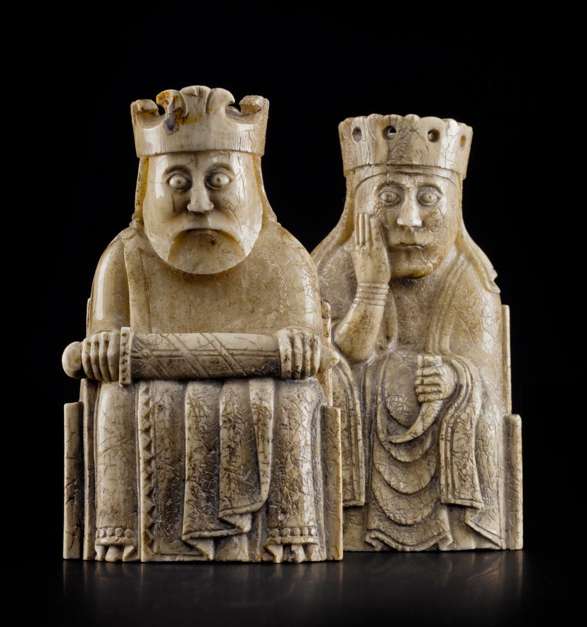 A king and queen piece from the Lewis Chessmen set, 12th century, made in Scandinavia and discovered on the Isle of Lewis. Walrus ivory. (<a href="https://commons.wikimedia.org/wiki/Category:NMS_Collection_of_Lewis_Chessmen" target="_blank" rel="nofollow noopener">National Museums Scotland</a>/<a href="https://creativecommons.org/licenses/by-sa/4.0/deed.en" target="_blank" rel="nofollow noopener">CC BY-SA 4.0</a>)