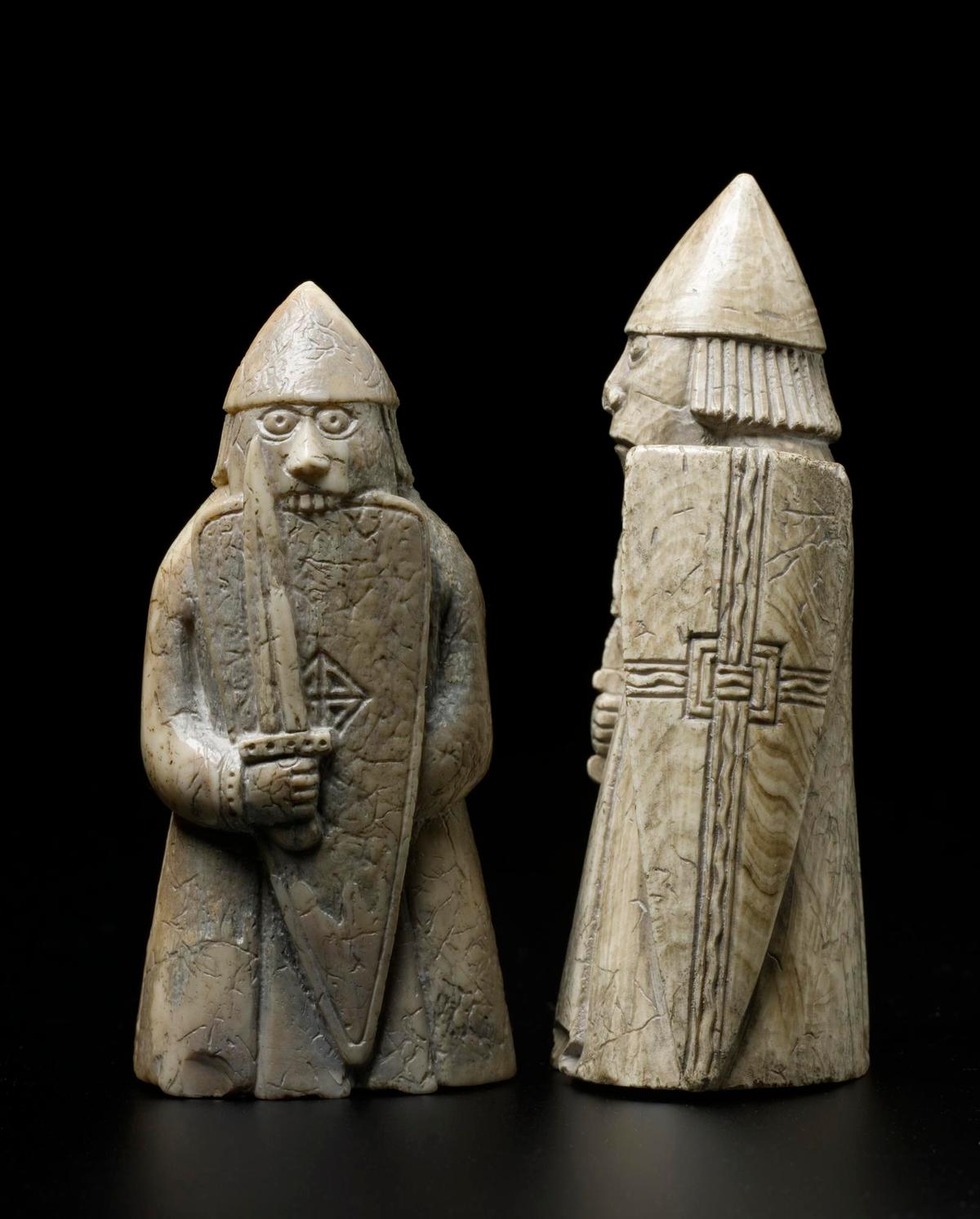 Two warders or rooks from the Lewis Chessmen set, 12th century, made in Scandinavia and discovered on the Isle of Lewis. Sperm whale tooth. (<a href="https://commons.wikimedia.org/wiki/Category:NMS_Collection_of_Lewis_Chessmen" target="_blank" rel="nofollow noopener">National Museums Scotland</a>/<a href="https://creativecommons.org/licenses/by-sa/4.0/deed.en" target="_blank" rel="nofollow noopener">CC BY-SA 4.0</a>)