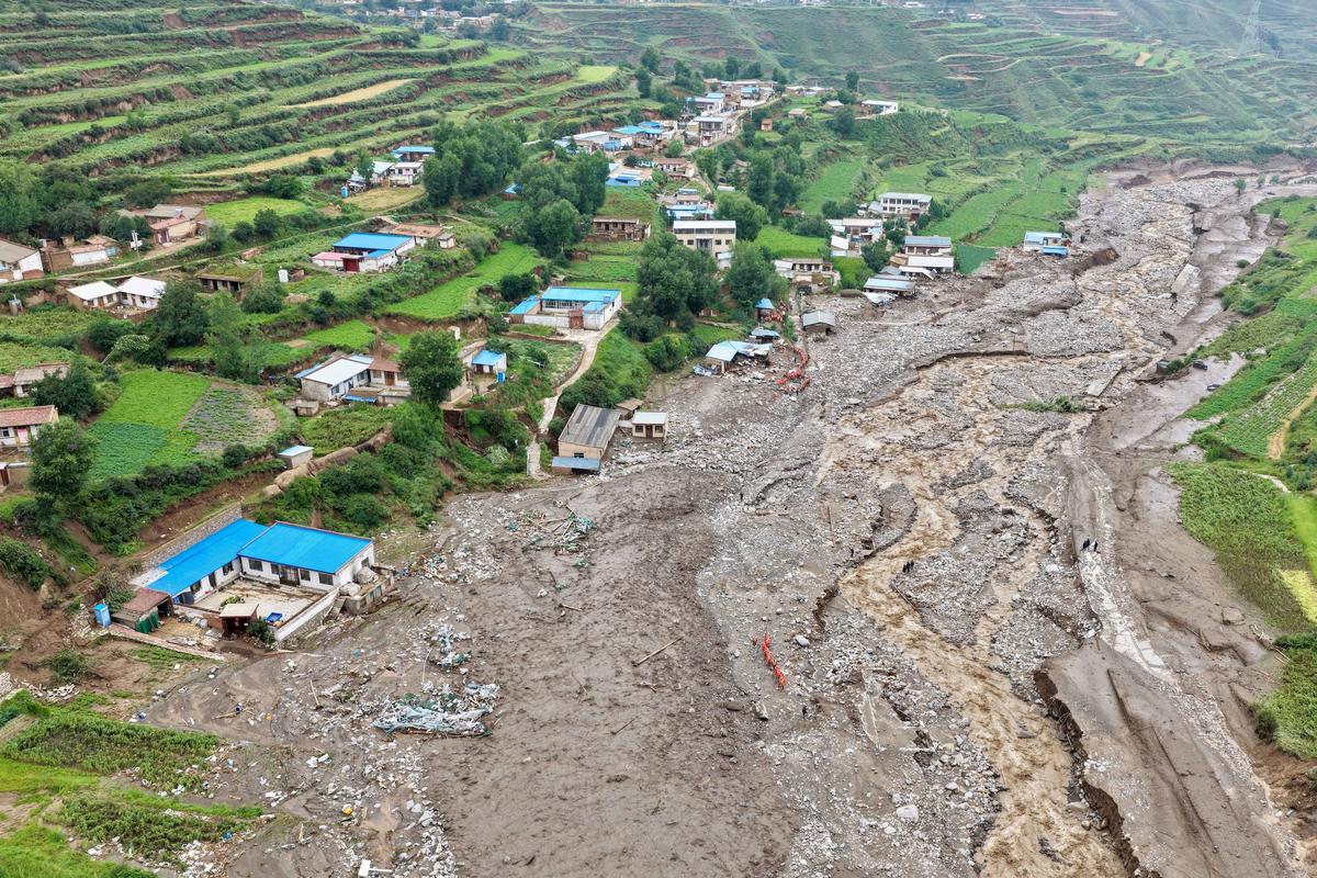 At Least 13 Dead as Torrential Rains Hammer Northern China