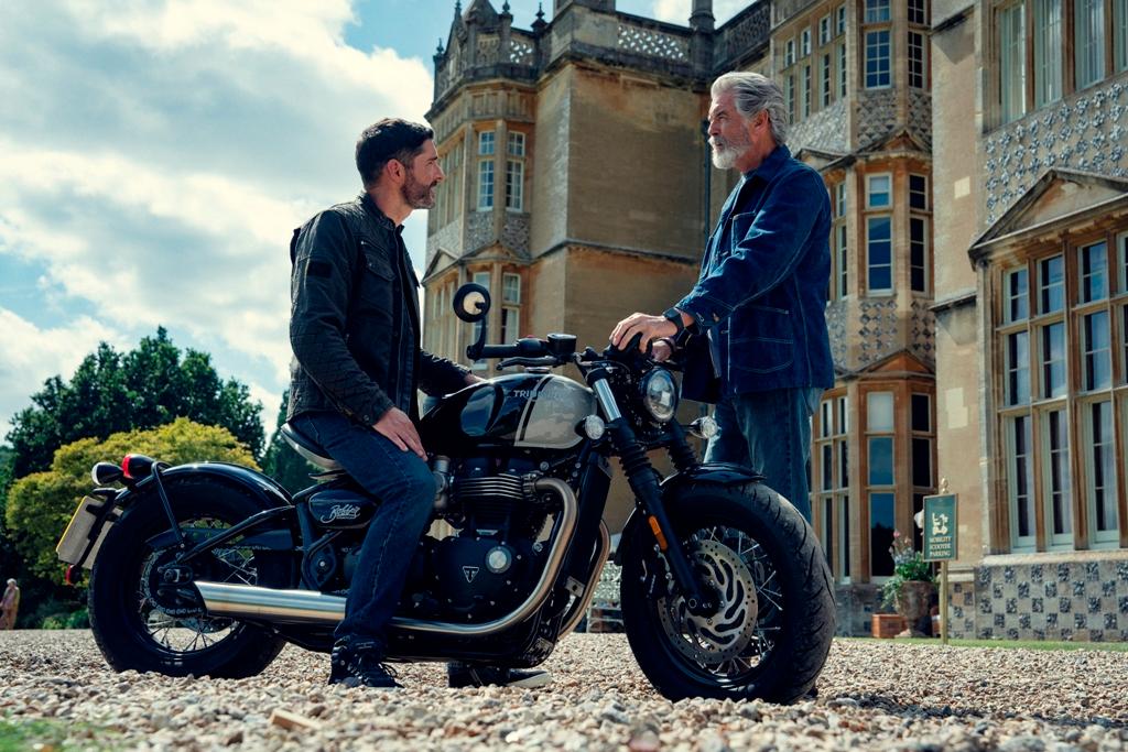 Jason Ritchie, Ron's son (Tom Ellis, L) and Ron Ritchie (Pierce Brosnan), in “The Thursday Murder Club.” (Netflix)