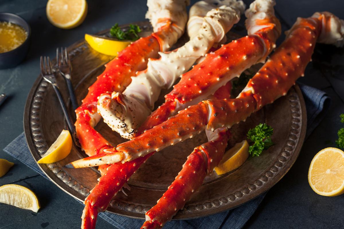 Once the shell is cracked, crab legs need little more than butter to shine. (bhofack2/Getty Images)
