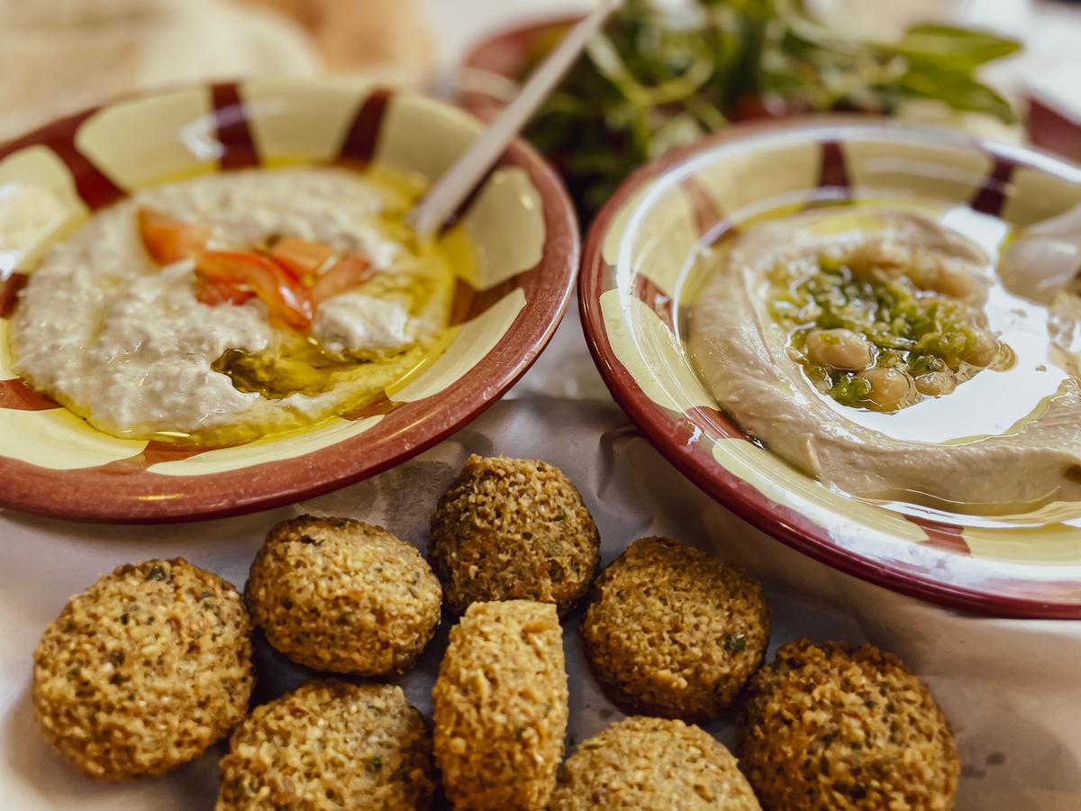 <span style="font-weight: 400;">Pureed chickpeas and tahini are finished with olive oil to make the perfect hummus.</span> (Bubibel/Getty Images)