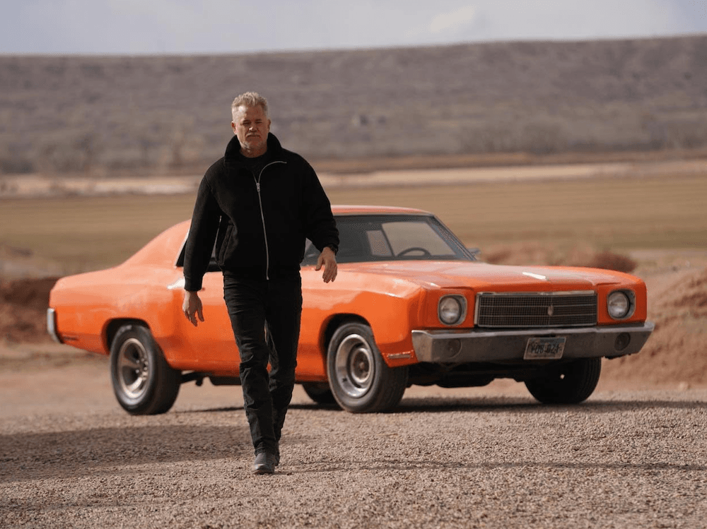 Dillon MacIntosh (Eric Dane) has stolen an important shirt in "Americana." (Lionsgate)