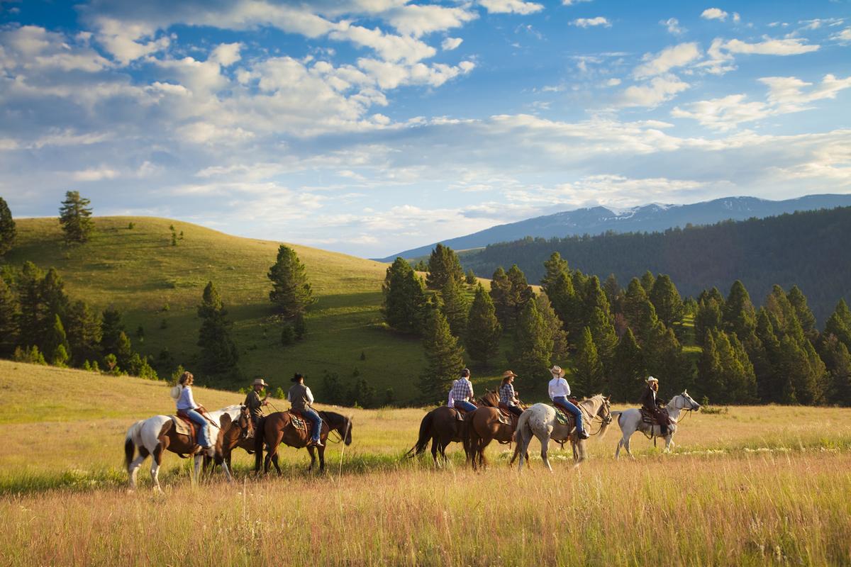 At the Ranch at Rock Creek, wranglers are on hand to give visitors the full Western experience, whether in the corral or on the trail. (The Ranch at Rock Creek)
