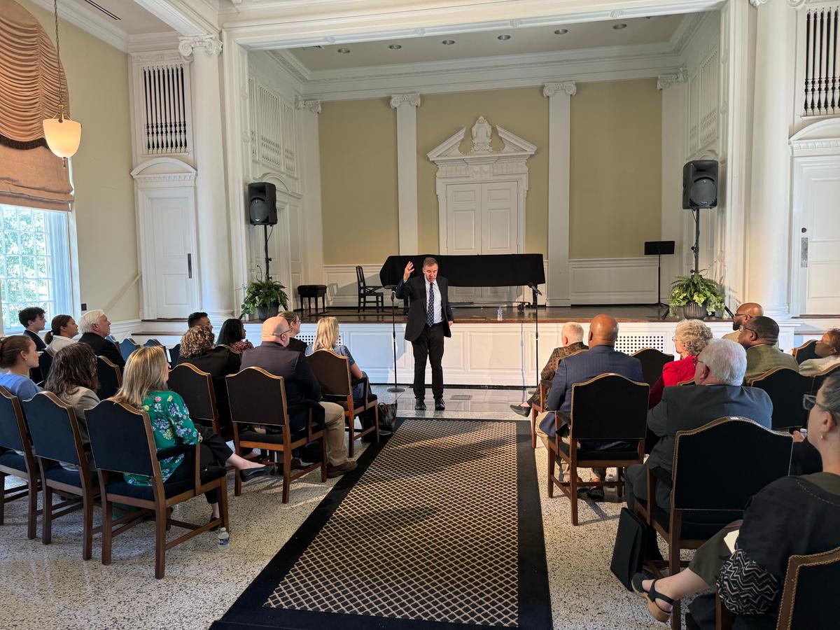 U.S. Sen. Mark Warner (D-Va.) speaks with education leaders at Randolph College in Lynchburg, Va., on Aug. 27, 2025 (Arjun Singh/The Epoch Times)