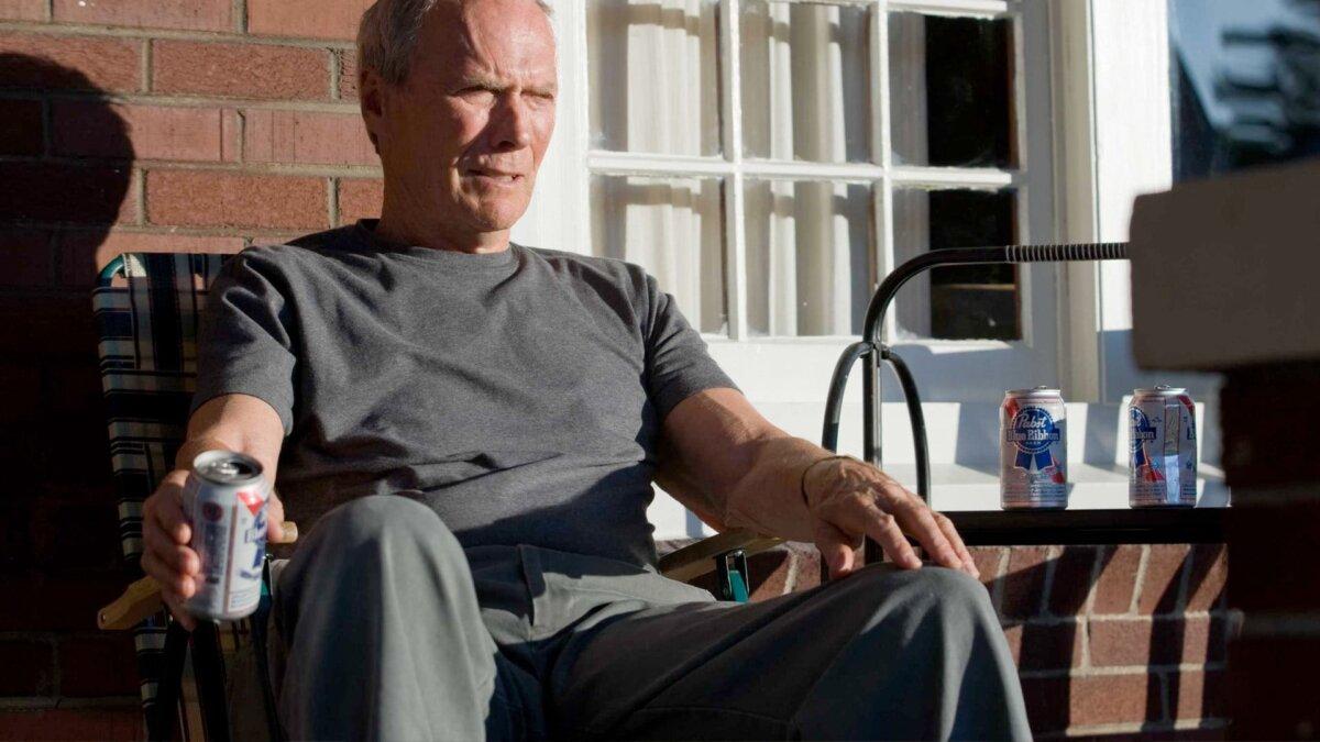 Clint Eastwood sits on his porch in "Gran Torino." (Warner Bros. Pictures)