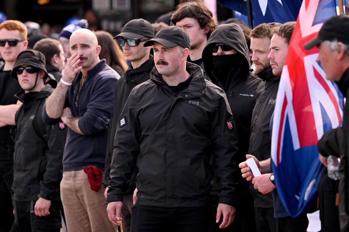 National Socialist Network member Thomas Sewell (C) leads his band of supporters who took part in the broader "March for Australia" immigration rally in Melbourne, Australia on Aug. 31, 2025. (William West/AFP via Getty Images)
