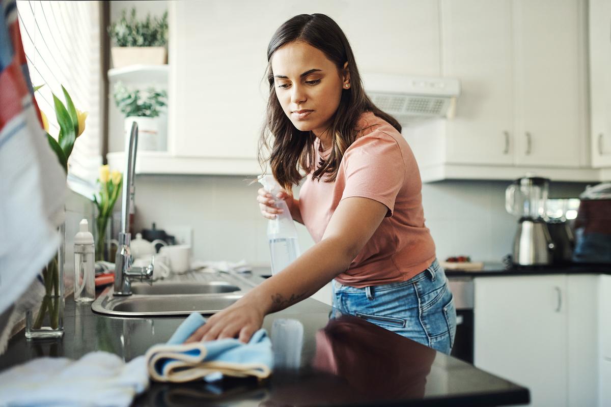 A spotless counter and clean appliances matter more than scrubbing behind the scenes. (PeopleImages/Getty Images)