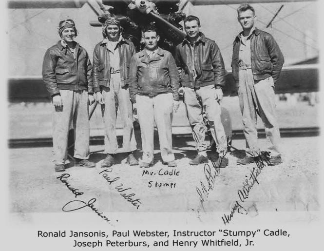 Peterbur<span style="color: #333333;">s (2nd R)</span> with an instructor and some fellow pilots. (Courtesy of Joseph Peterburs)