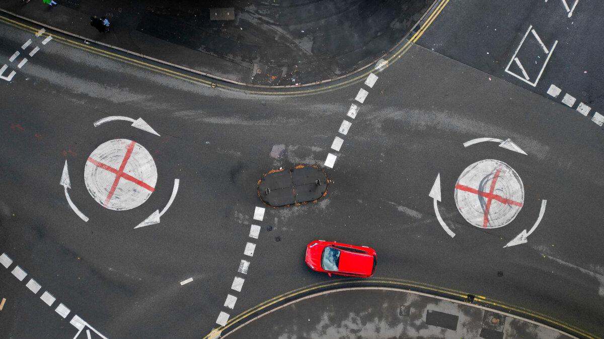 The flag of England painted on mini roundabouts in Walsall, Staffordshire, UK, on Aug. 29, 2025. (Christopher Furlong/Getty Images)