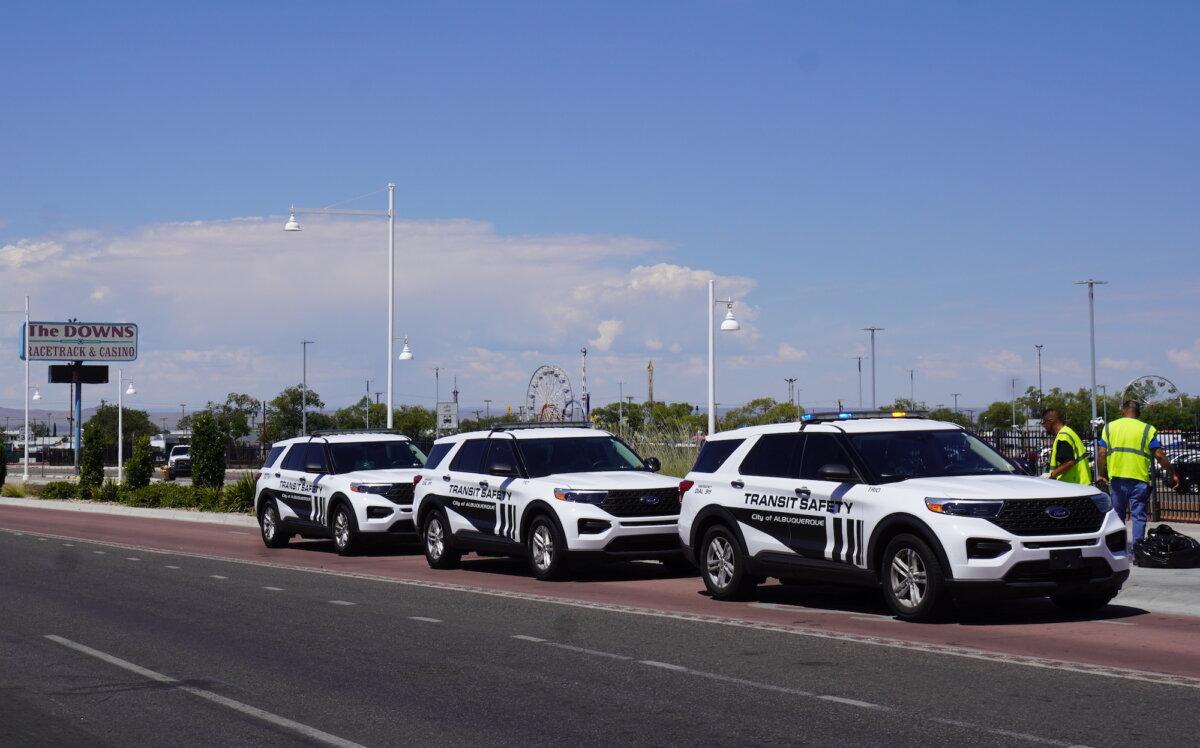 Transit police vehicles line Central Avenue within the International District in Albuquerque, N.M., on Sept. 3, 2025. (Allan Stein/The Epoch Times)