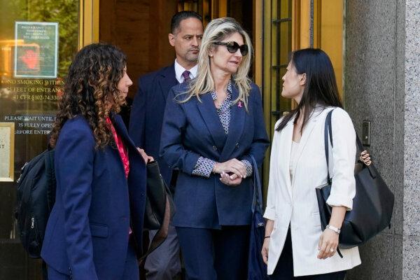Nadine Menendez, wife of former Sen. Bob Menendez (D-N.J.), (C) accompanied by her lawyer Sarah Krissoff (L), leaves a Manhattan federal court in New York City on Sept. 11, 2025. (Richard Drew /AP Photo)
