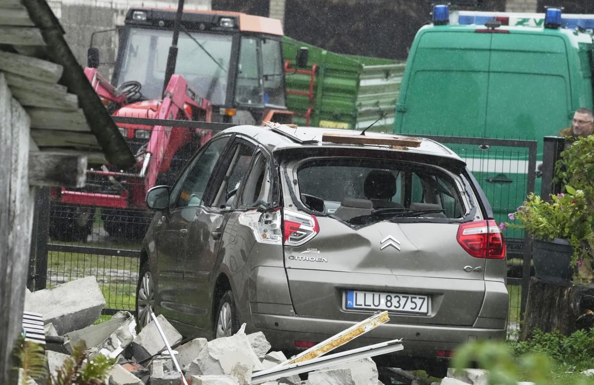 A car damaged by debris falling from a destroyed roof, after drones were shot down in Wyryki near Lublin, Poland, on Sept. 11, 2025. (Czarek Sokolowski/AP)