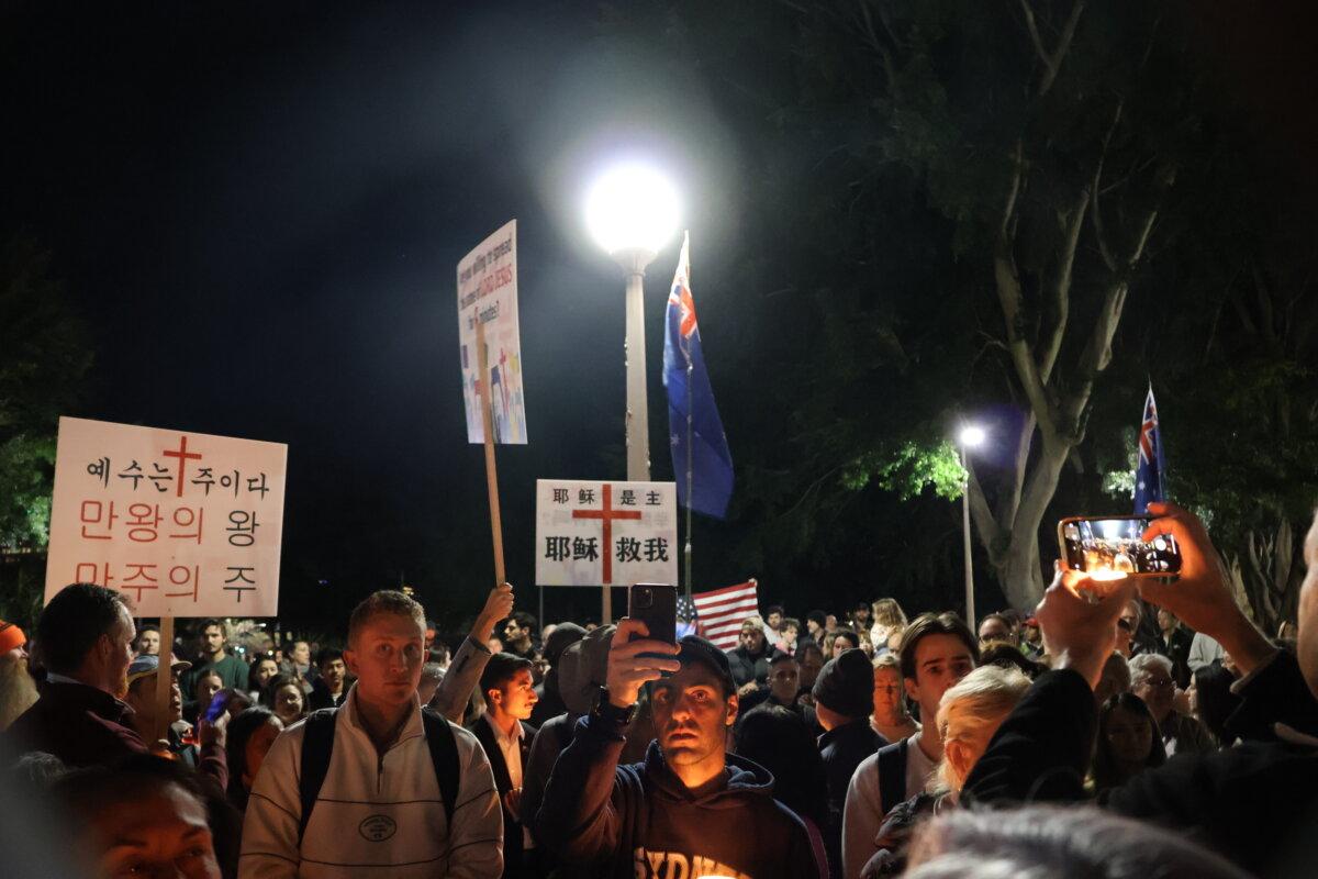Australians held a vigil night for young American conservative activist Charlie Kirk in Sydney, Australia on Sept. 12, 2025. (Rachel Qu/The Epoch Times)