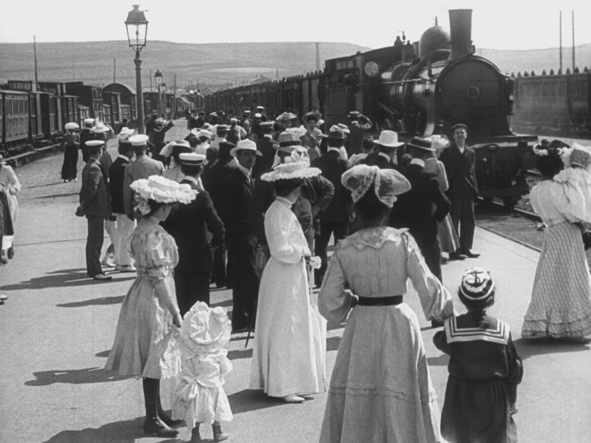 Families at the turn of the 19th century wait at a train stop, in "Trains." (Bill Morrison)