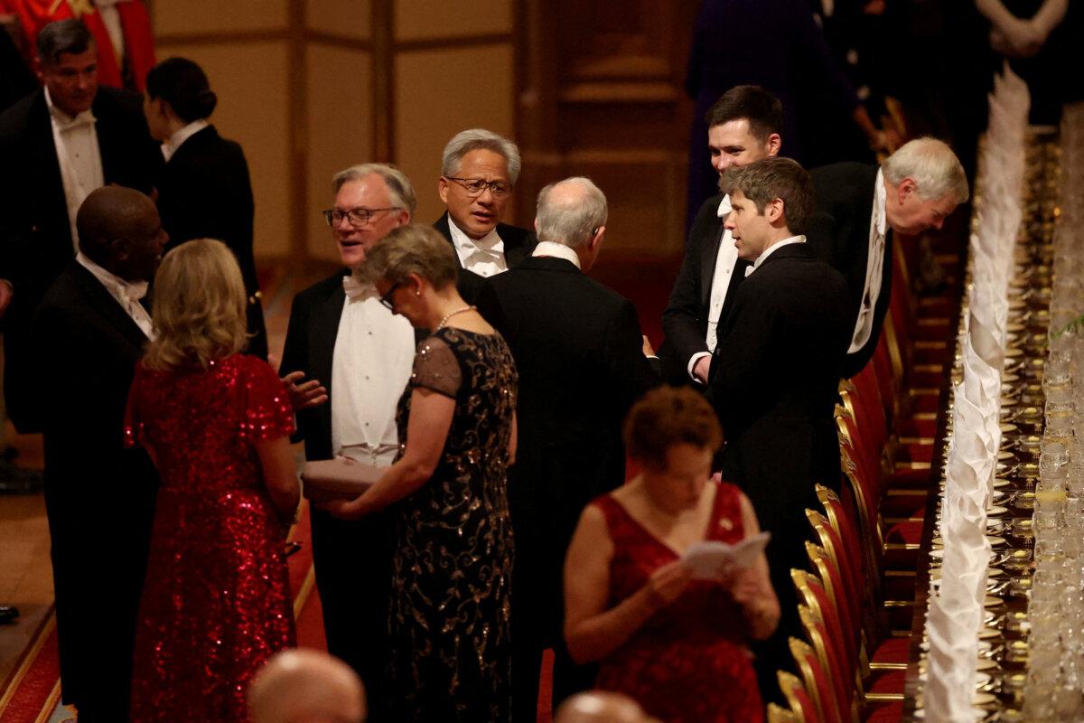 UK Foreign Secretary Yvette Cooper (4th L), husband Ed Balls (3rd L), Nvidia CEO Jensen Huang (C), and other guests arrive for the State Banquet hosted by King Charles III and members of the Royal Family at Windsor Castle during the state visit by the U.S. president, in Windsor, England, on Sept. 17, 2025. (Phil Noble-WPA Pool/Getty Images)