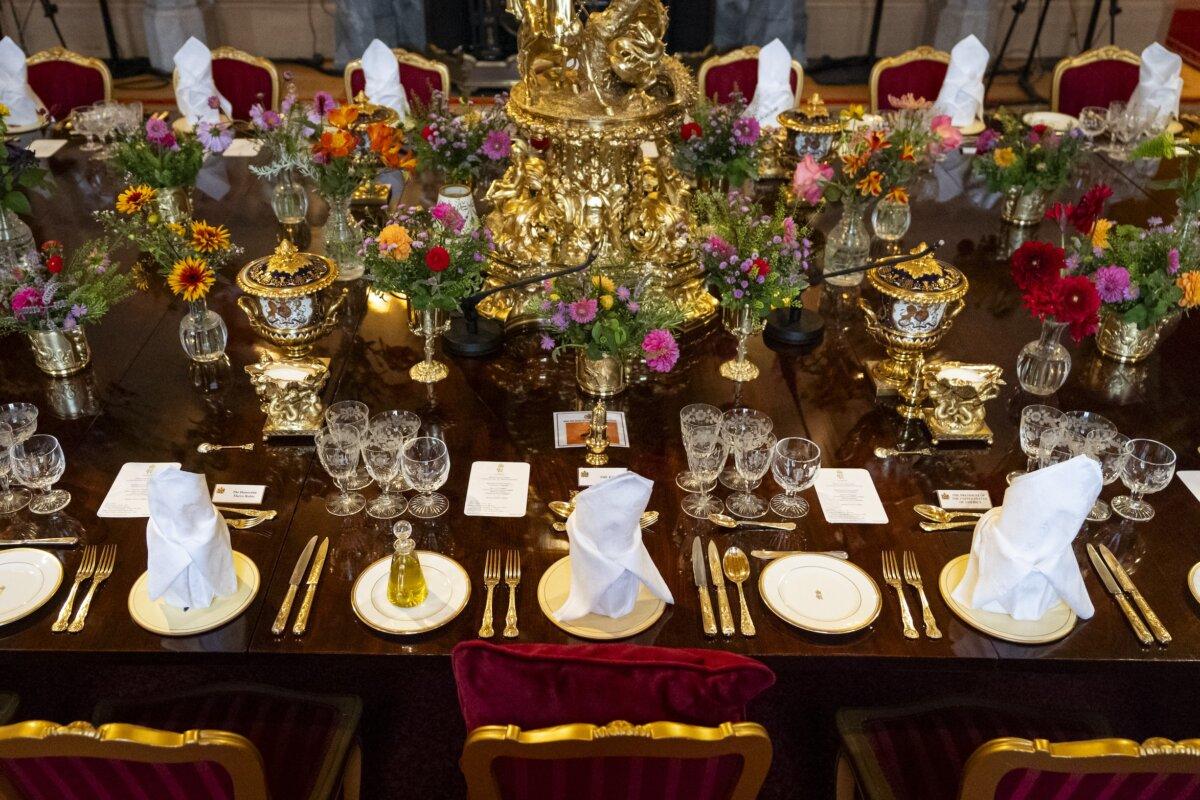 A place setting for King Charles III and U.S. President Donald Trump at the banquet table in St George's Hall ahead of the state banquet for Trump and his wife, First Lady Melania Trump, at Windsor Castle during the State visit by the U.S. president in Windsor, England, on Sept. 17, 2025. (Aaron Chown - WPA Pool/Getty Images)