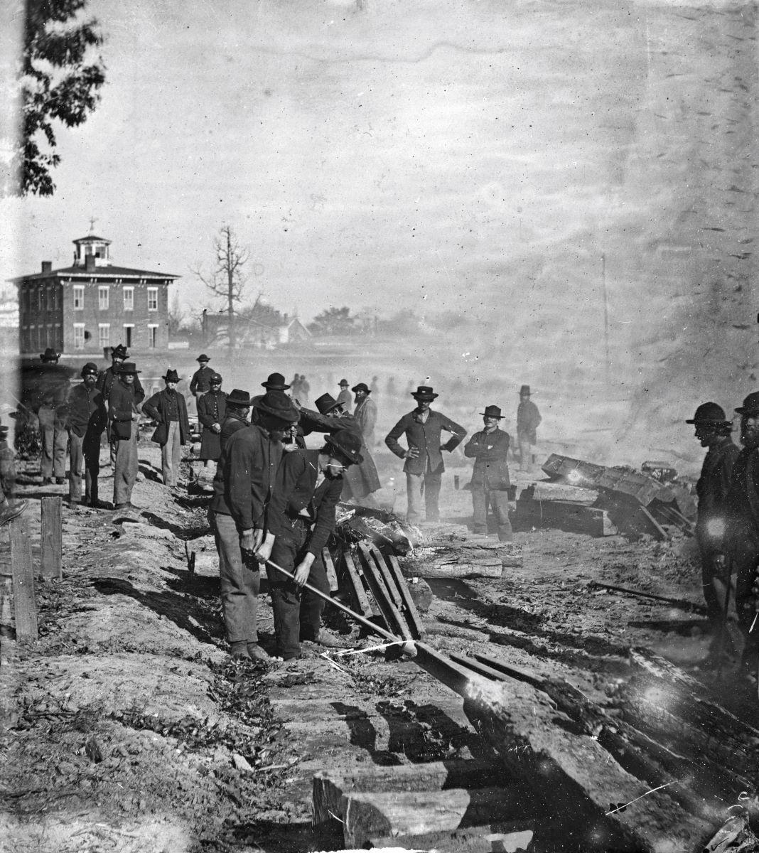 George N. Barnard photographed Sherman's troops destroying a railroad in Atlanta, in 1864. (Public Domain)