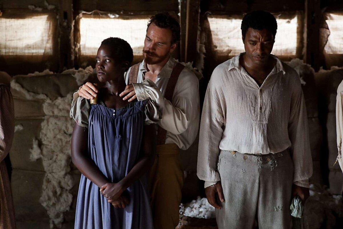 (L–R) Patsey (Lupita Nyong'o), Epps (Michael Fassbender), and Northup (Chiwetel Ejiofor), in "12 Years a Slave." (Fox Searchlight Pictures)