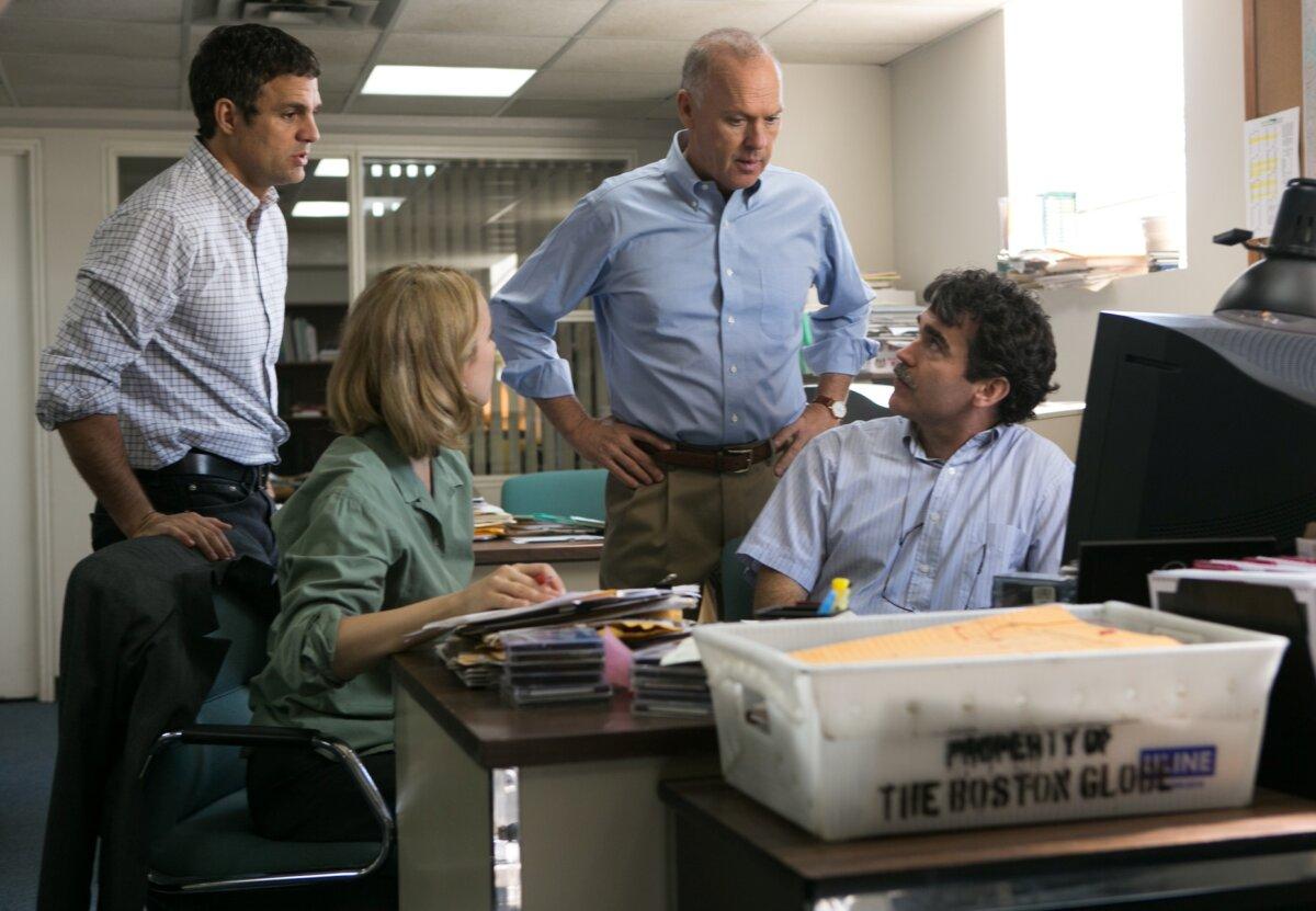 (L–R) Michael Rezendes (Mark Ruffalo), Sacha Pfeiffer (Rachel Adams), Robby Robinson (Michael Keaton), and Matt Carroll (Brian d'Arcy James), in "Spotlight." (Open Road Films)