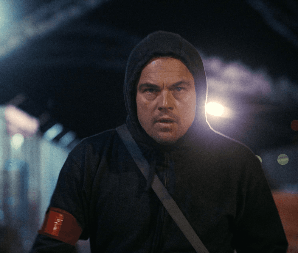 Bob Ferguson (Leonardo DiCaprio) doing anti-fascist things, in "One Battle After Another." (Warner Bros.)