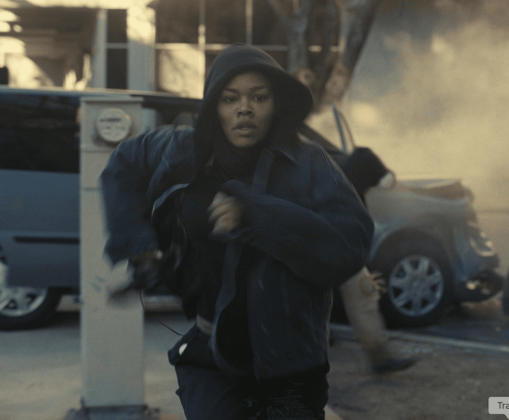 Perfidia Beverly Hills (Teyana Taylor) on the run, in "One Battle After Another." (Warner Bros.)