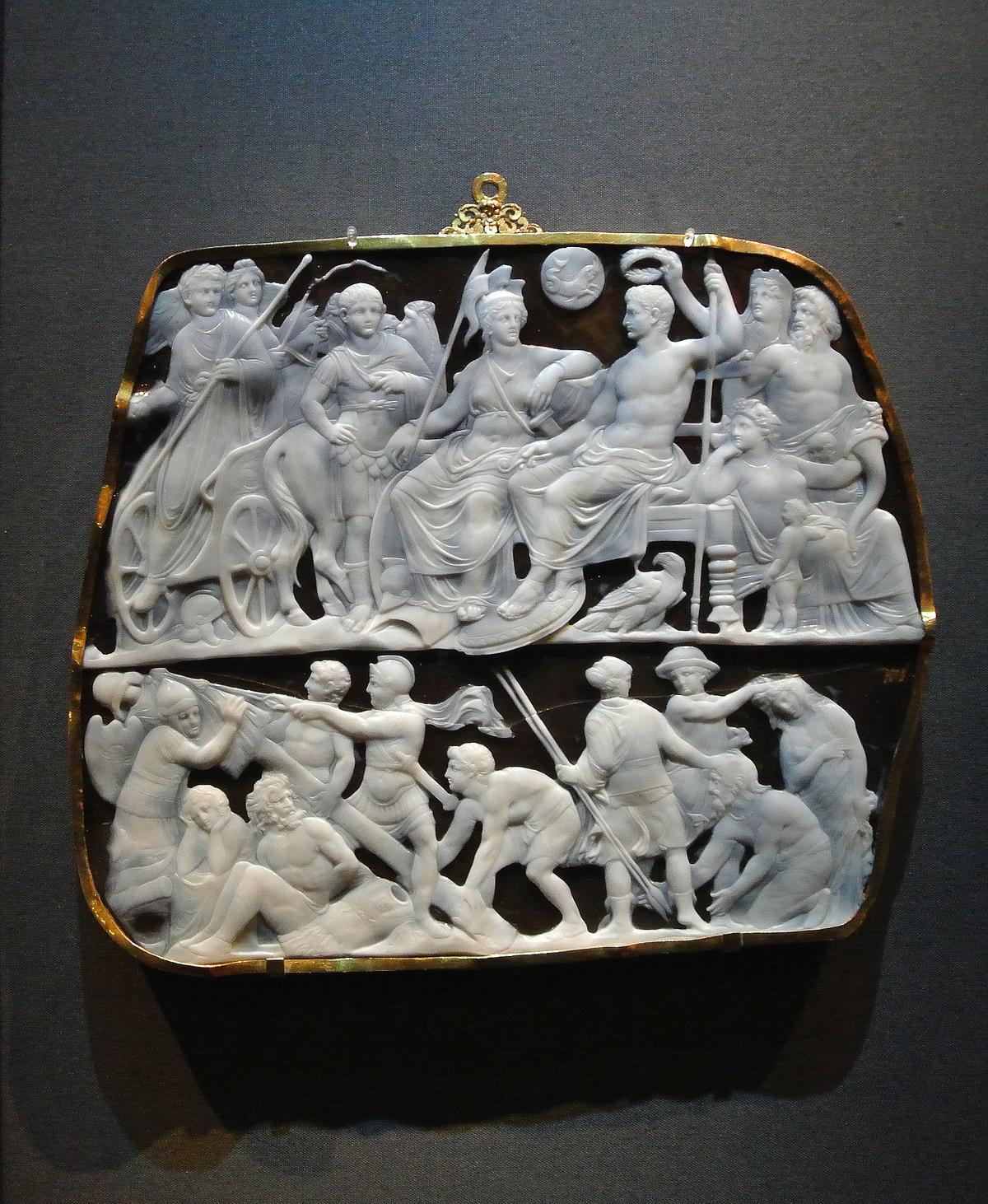 Dioskourides, “Gemma Augustea,”  A.D. 9–12. Onyx, two-layered, in gold band; 7 1/2 inches by 9 inches. Kunsthistorisches Museum, Vienna. (<a title="User:Jdsteakley" href="https://commons.wikimedia.org/wiki/User:Jdsteakley">James Steakley</a>/<a href="https://creativecommons.org/licenses/by-sa/3.0/deed.en" target="_blank" rel="nofollow noopener">CC BY-SA 3.0</a>)