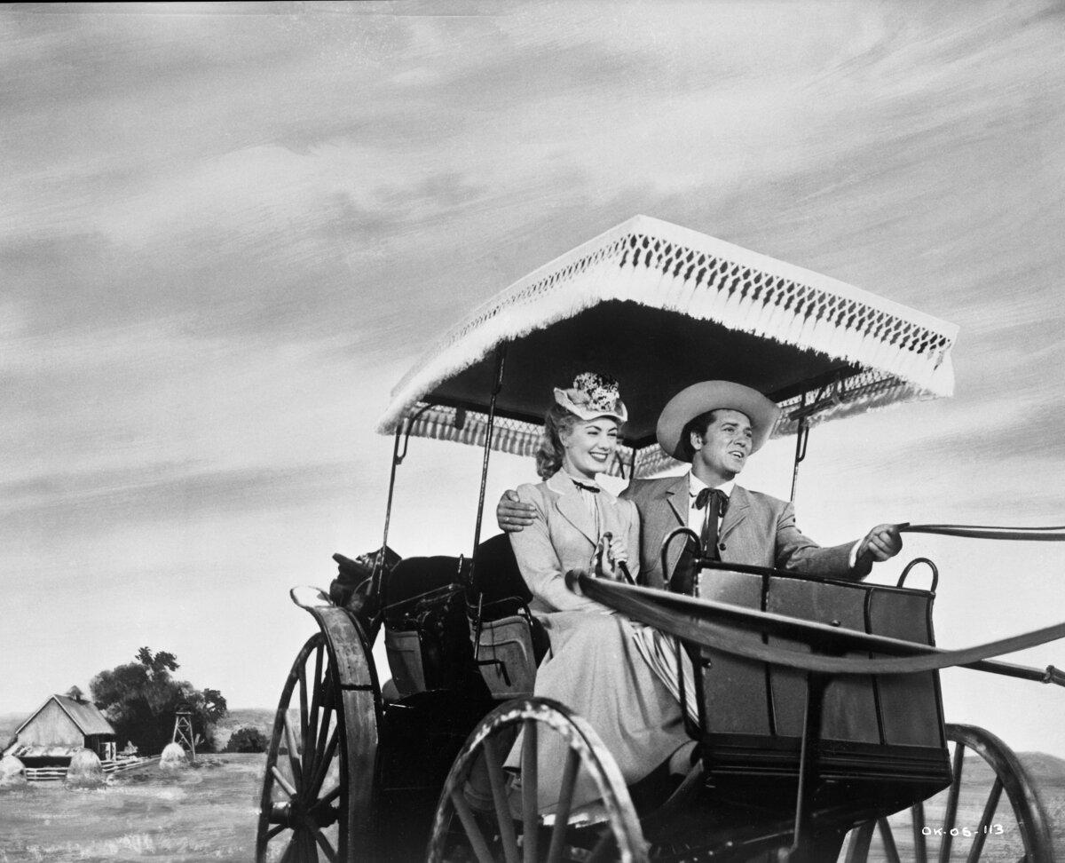 Laurey Williams (Shirley Jones) finds happiness with cowboy Curly McLain (Gordon MacRae), in the rousing musical "Oklahoma!" (RKO Radio Pictures/MovieStillsDB)