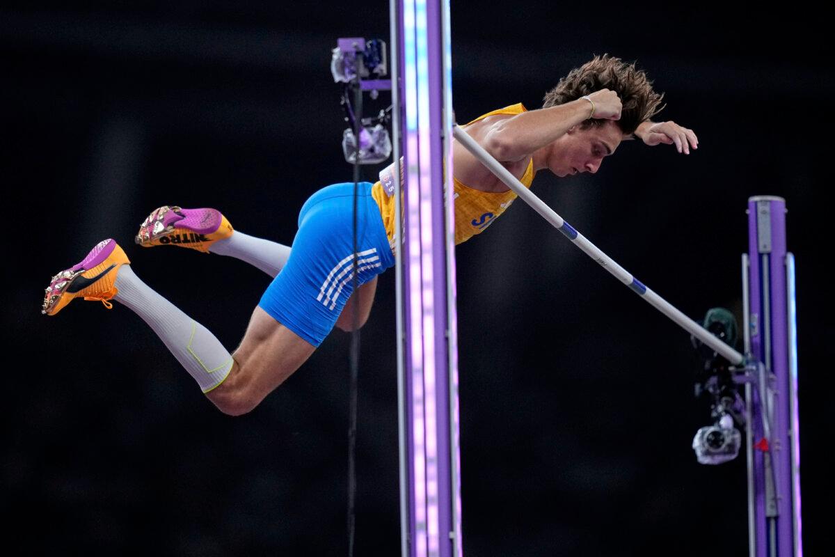 Sweden's Armand Duplantis making a clearance in the men's pole vault final at the World Athletics Championships in Tokyo on Sept. 15, 2025. (Louise Delmotte/AP Photo)
