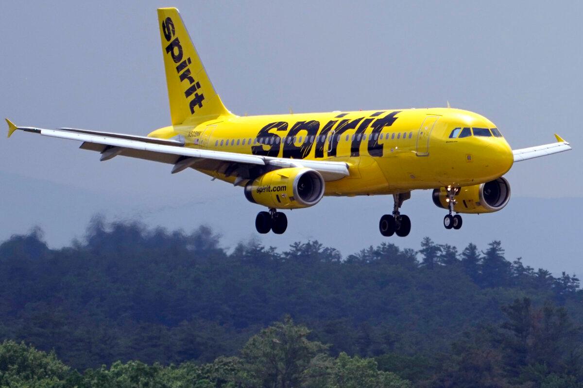 A Spirit Airlines 319 Airbus approaches Manchester Boston Regional Airport for a landing, in Manchester, N.H., on June 2, 2023. (Charles Krupa/AP Photo)