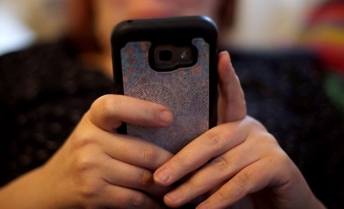 Digital IDs will become mandatory to prove the right to work under the Labour government's proposal (Yui Mok/PA)