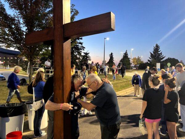 A vigil for victims of the church shooting and fire was held at Henry Ford Genesys Hospital on Sept. 30. (Jeff Louderback/The Epoch Times)