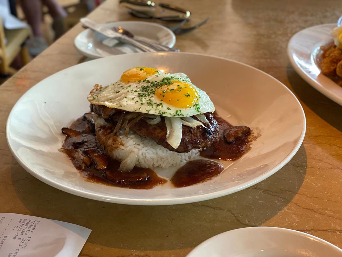 Loco moco is a traditional Hawaiian comfort dish consisting of white rice topped with a hamburger patty, a fried egg, and brown gravy. (imtory/Shutterstock)