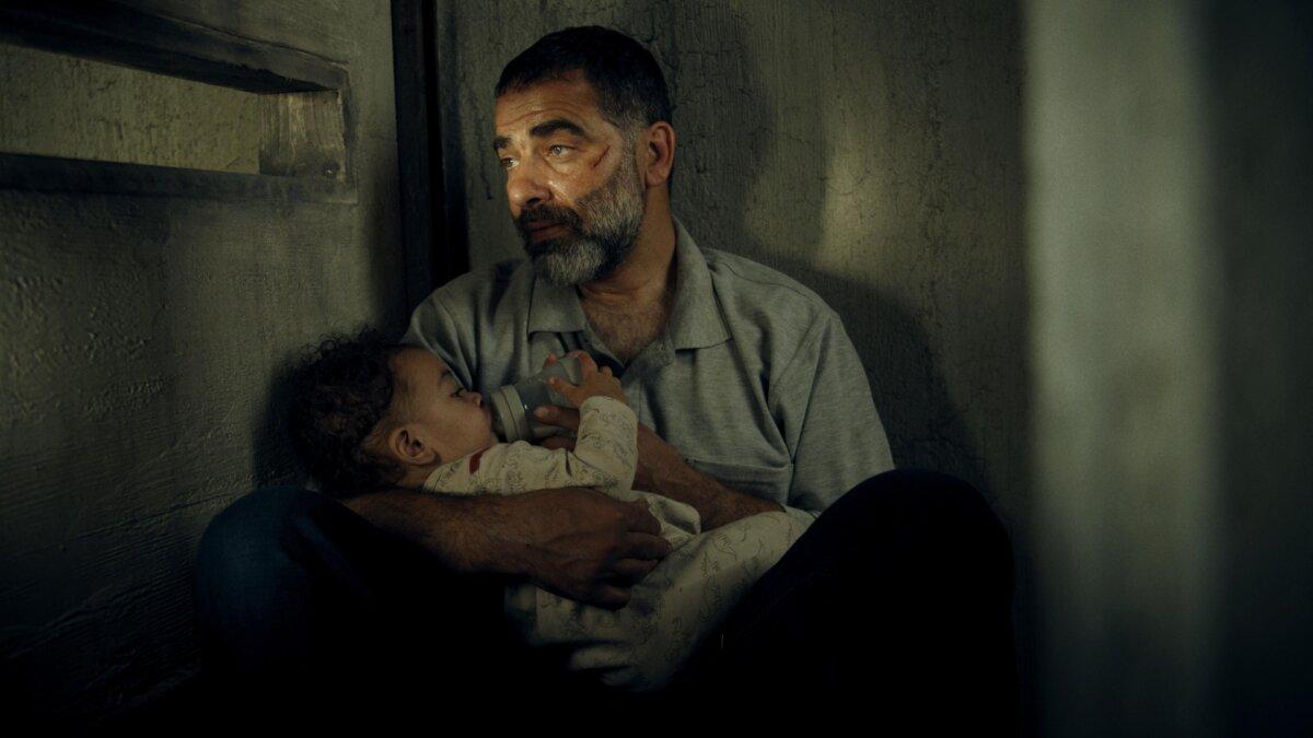 Ayub (Hisham Sul<strong>i</strong>man) in hiding, in “Red Alert.” (Paramount+)