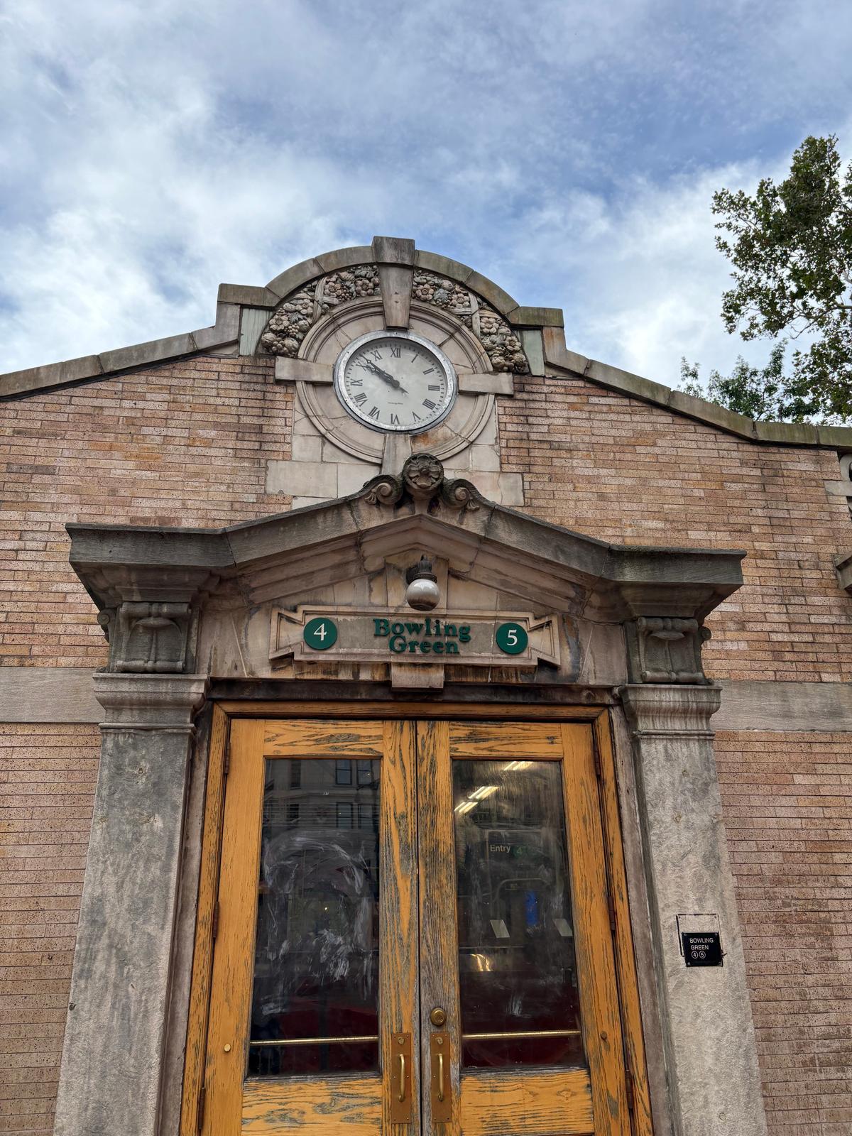 A classic analog clock complements the brick and masonry of Bowling Green Station. (Deena Bouknight)