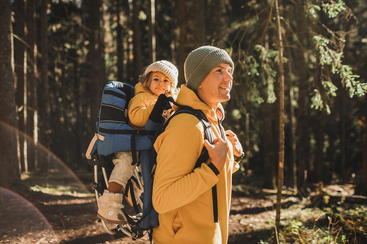 Toddler carriers can make traveling easier and have the added bonus of keeping kids safe and secure. (Oleg Breslavtsev/Getty Images)