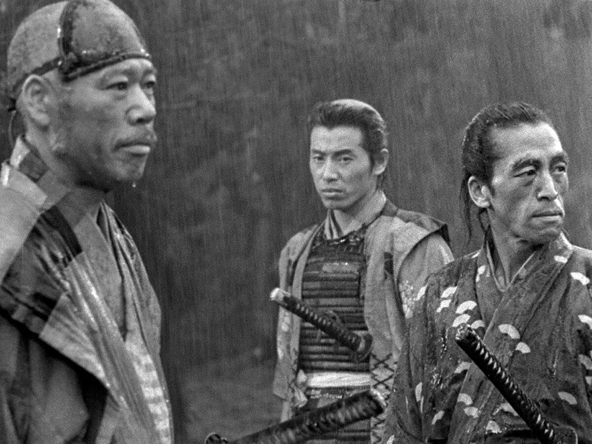 (L–R) Kambei Shimada (Takashi Shimura), young Katsushiro (Isao Kimura), and sword master Kyuzo (Seiji Miyaguchi), in “Seven Samurai.” (Toho)