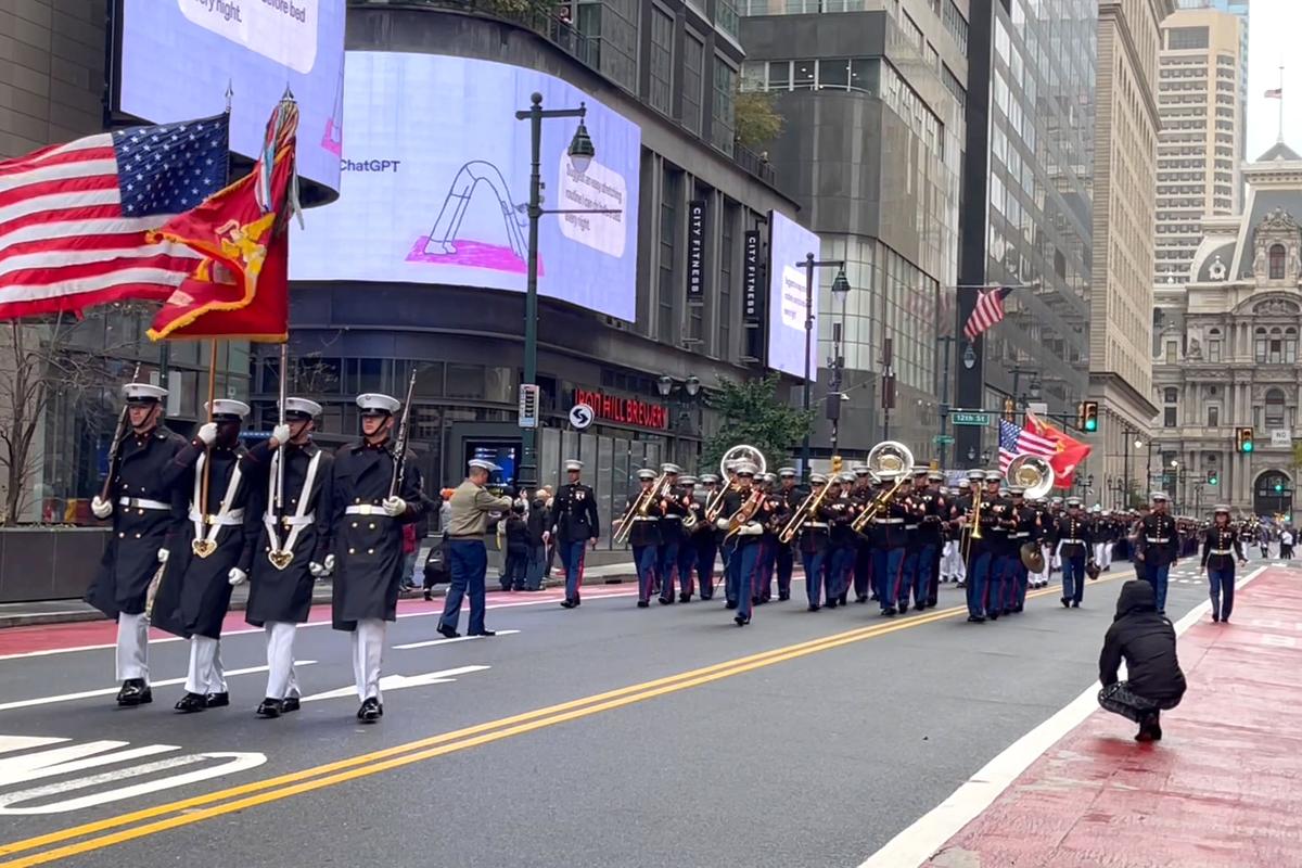 Thousands lined Market Street in Philadelphia for a grand parade, honoring the 250th anniversary of the U.S. Navy and Marine Corps, on Oct. 13, 2025. (Frank Liang/The Epoch Times)