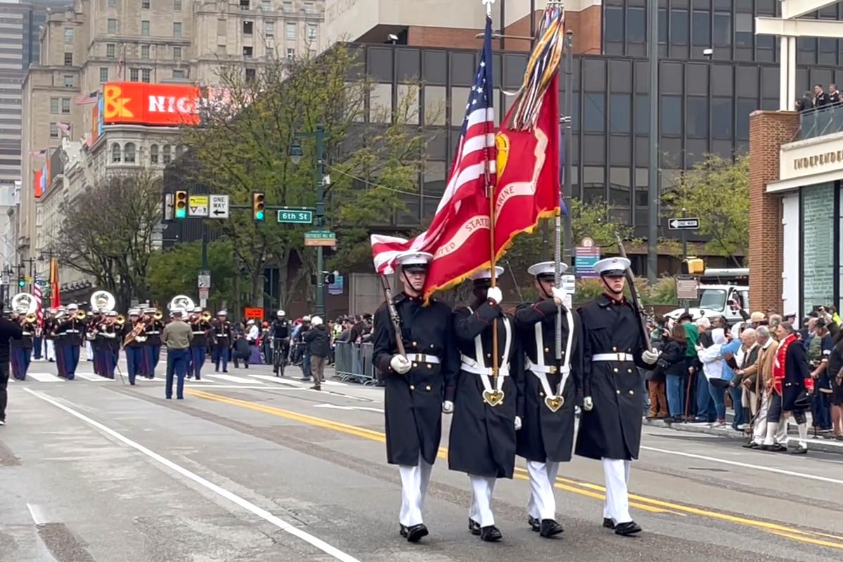 Thousands lined Market Street in Philadelphia for a grand parade, honoring the 250th anniversary of the U.S. Navy and Marine Corps, on Oct. 13, 2025. (Frank Liang/The Epoch Times)