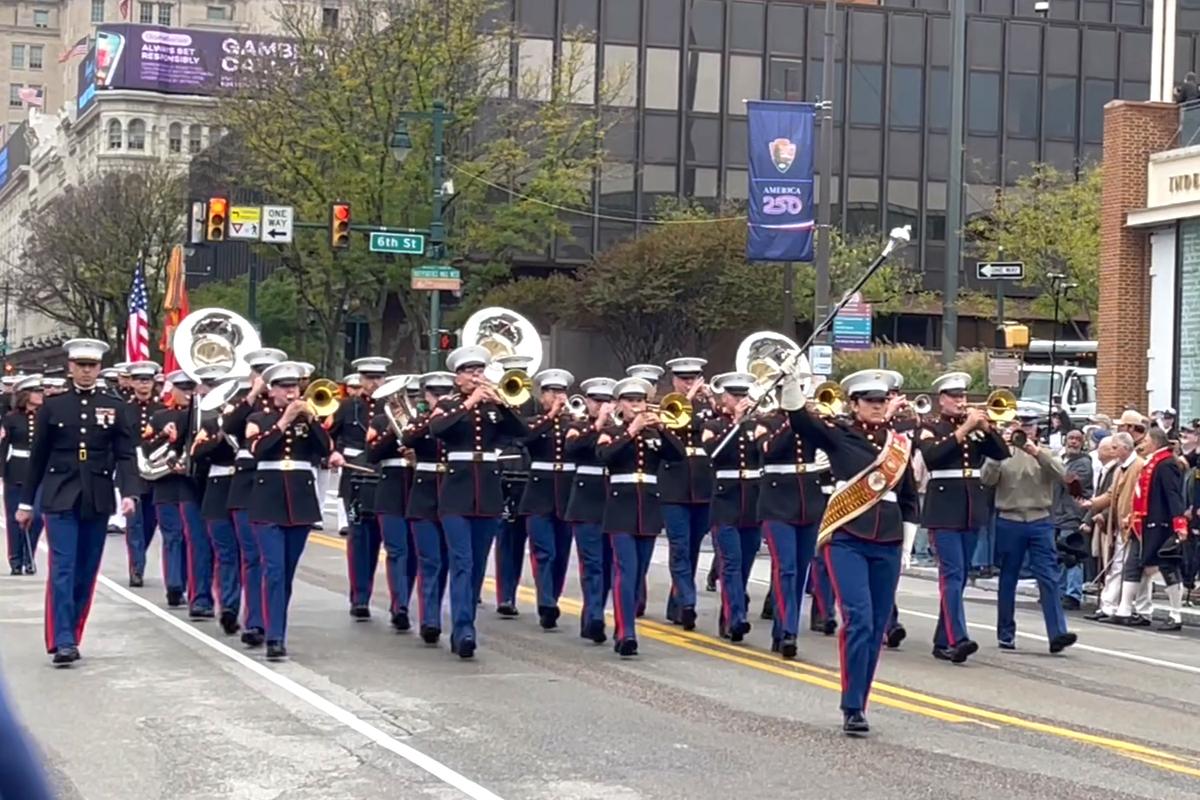 Thousands lined Market Street in Philadelphia for a grand parade, honoring the 250th anniversary of the U.S. Navy and Marine Corps, on Oct. 13, 2025. (Frank Liang/The Epoch Times)