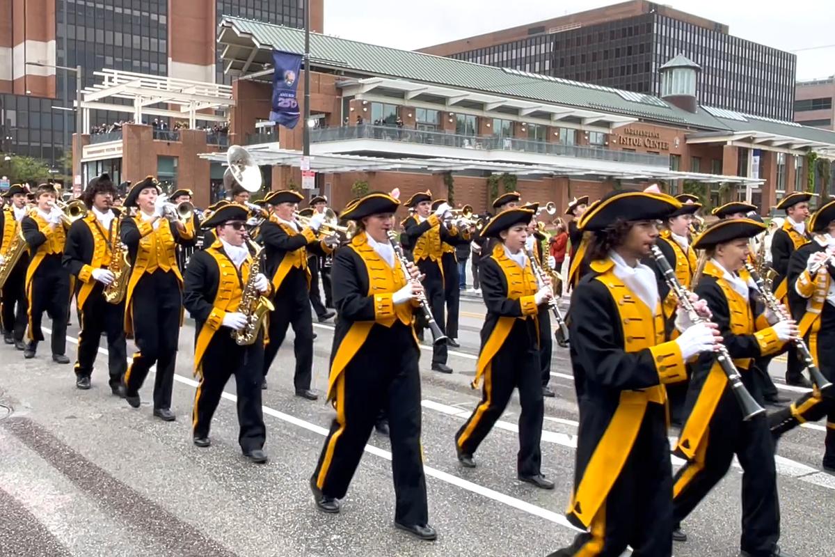 Thousands lined Market Street in Philadelphia for a grand parade, honoring the 250th anniversary of the U.S. Navy and Marine Corps, on Oct. 13, 2025. (Frank Liang/The Epoch Times)