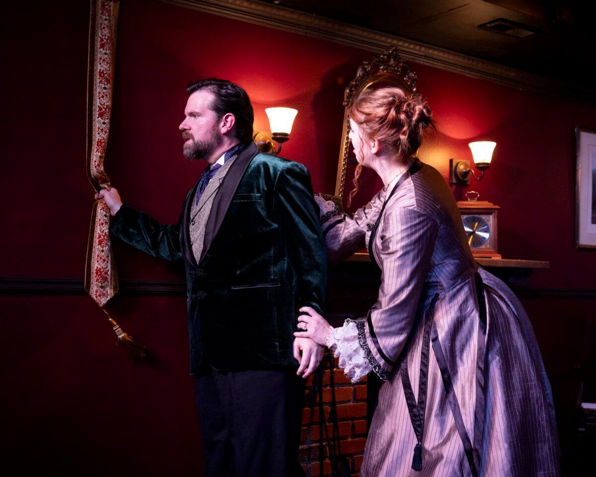 Mr. Manningham (Sam Fain) and his wife (Megan Kueter), in “Gaslight (Angel Street).” (Gosia Matuszewska)