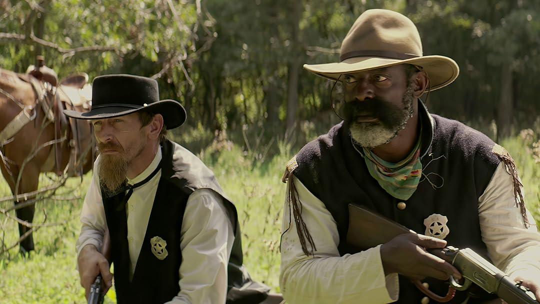 Sam Tanner (Jason Johnson, L) and Reeves (Isaiah Washington), in "Corsicana." (Rose Dover Entertainment)