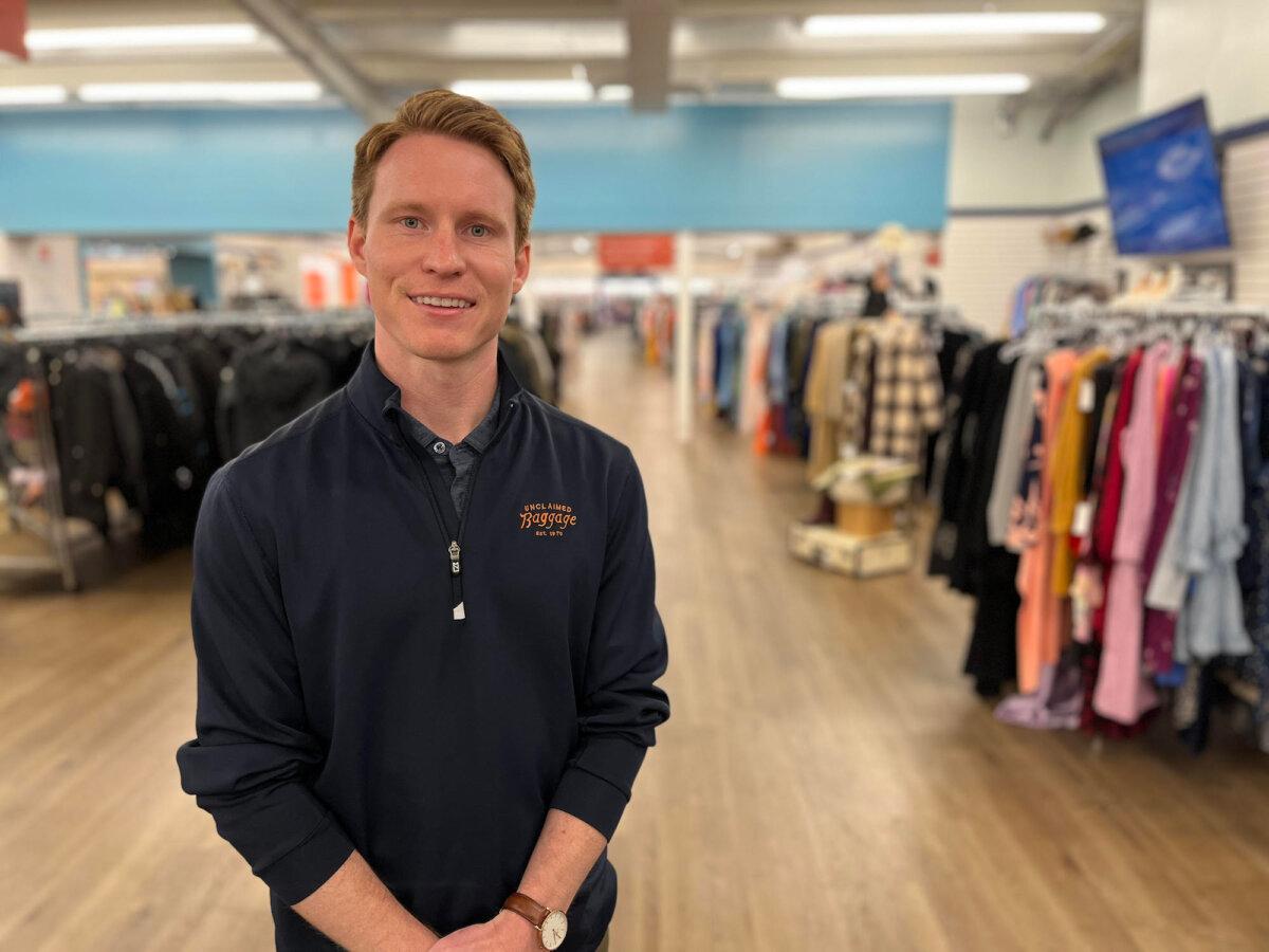 Matt Owens, senior vice president of commercial strategy at Unclaimed Baggage, stands inside the store that spans an entire city block, on Oct. 8, 2025. (Allan Stein/The Epoch Times)