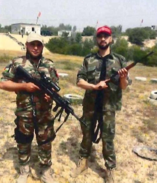 Mahmoud Amin Ya'qub Al-Muhtadi (R), in a photo that federal prosecutors say was sent to him on social media in 2019. (USDOJ)