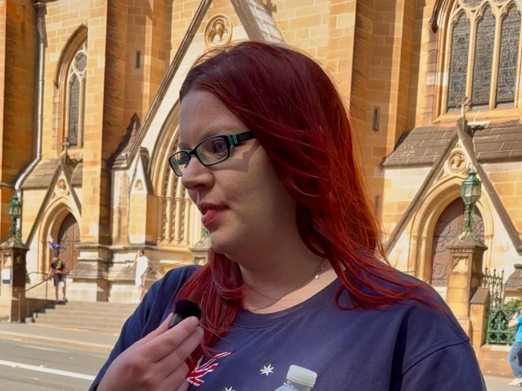 "Bec Freedom," key organiser of the March for Australia event against immigration policy, spoke to The Epoch Times in Hyde Park, Sydney in Australia on Oct. 19, 2025. (Hailey Do/The Epoch Times)