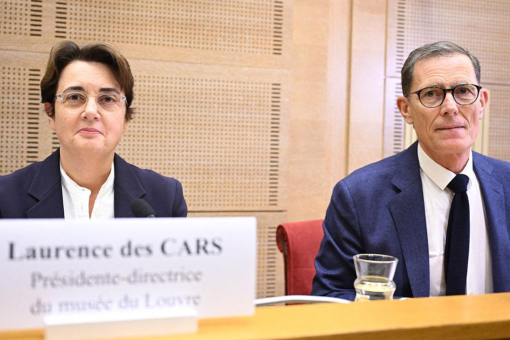 President of the Louvre Museum Laurence des Cars (L) looks on prior to the start of a hearing before the Senate's culture committee, chaired by French Senator Laurent Lafon (R) at the French Senate in Paris on Oct. 22, 2025. (Bertrand Guay/AFP via Getty Images)